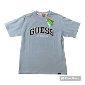 Men’s Guess T-shirt Small- light blue (Small but looks like Medium)